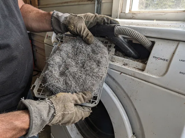 Cleaning Dryer Lint Trap in Coconut Creek